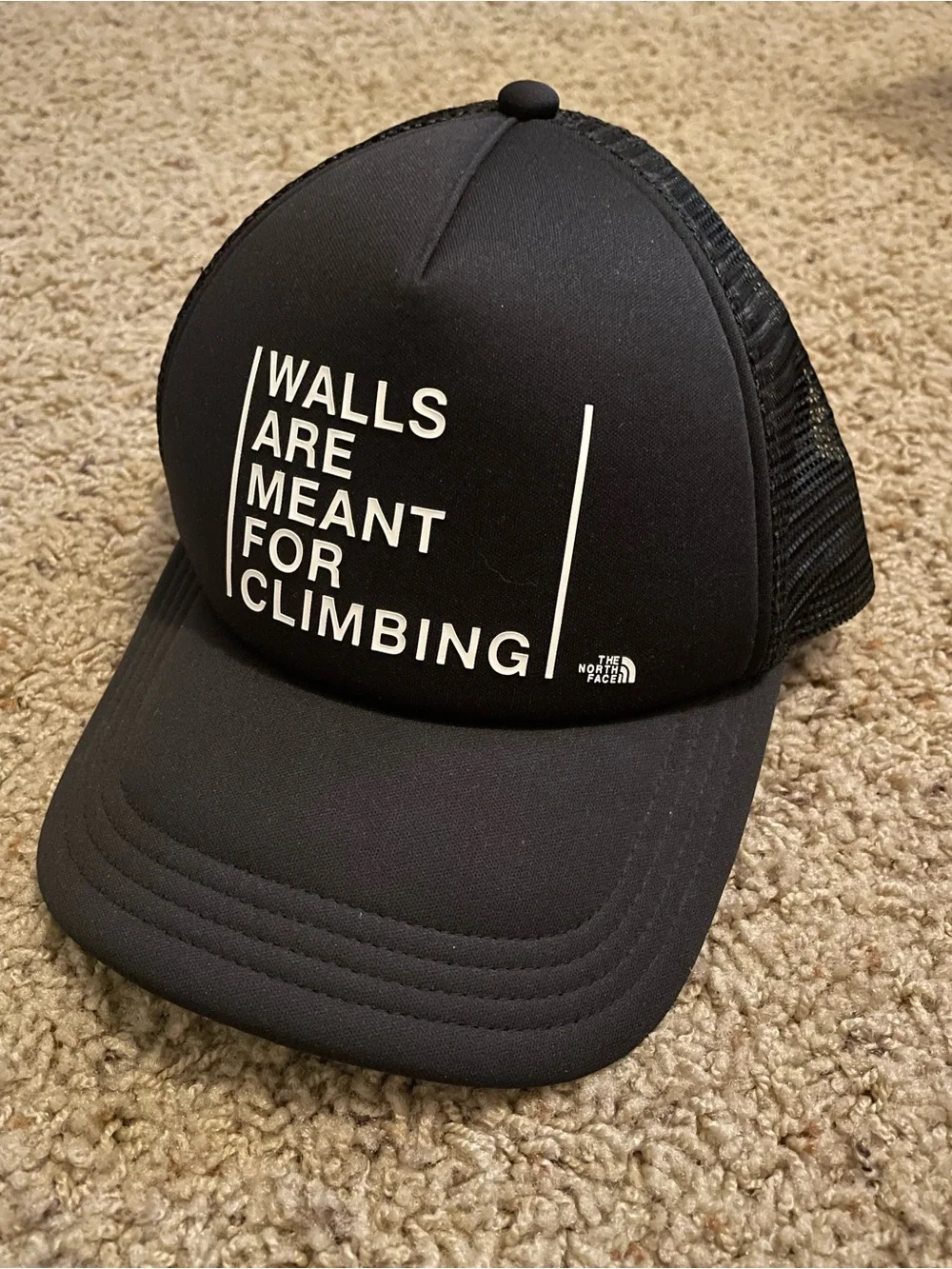 The North Face “Walls Are Meant For Climbing” trucker hat